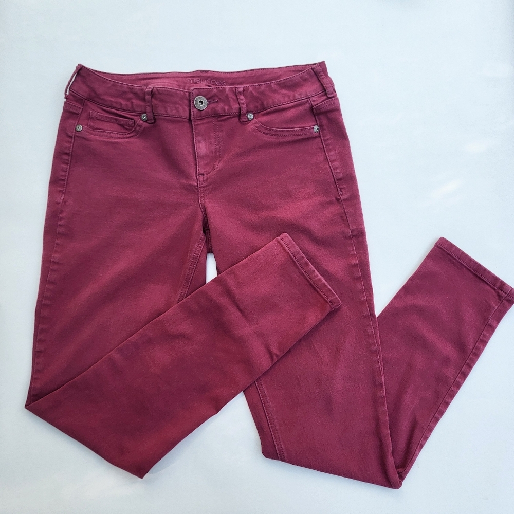 Dark pink skinny jeans
